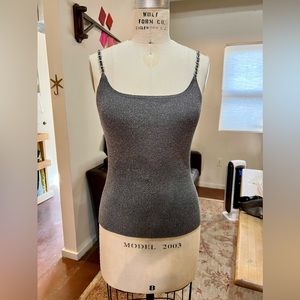 Sparkly rib knit cami style knit top. Metallic silver with velvet/chain straps
